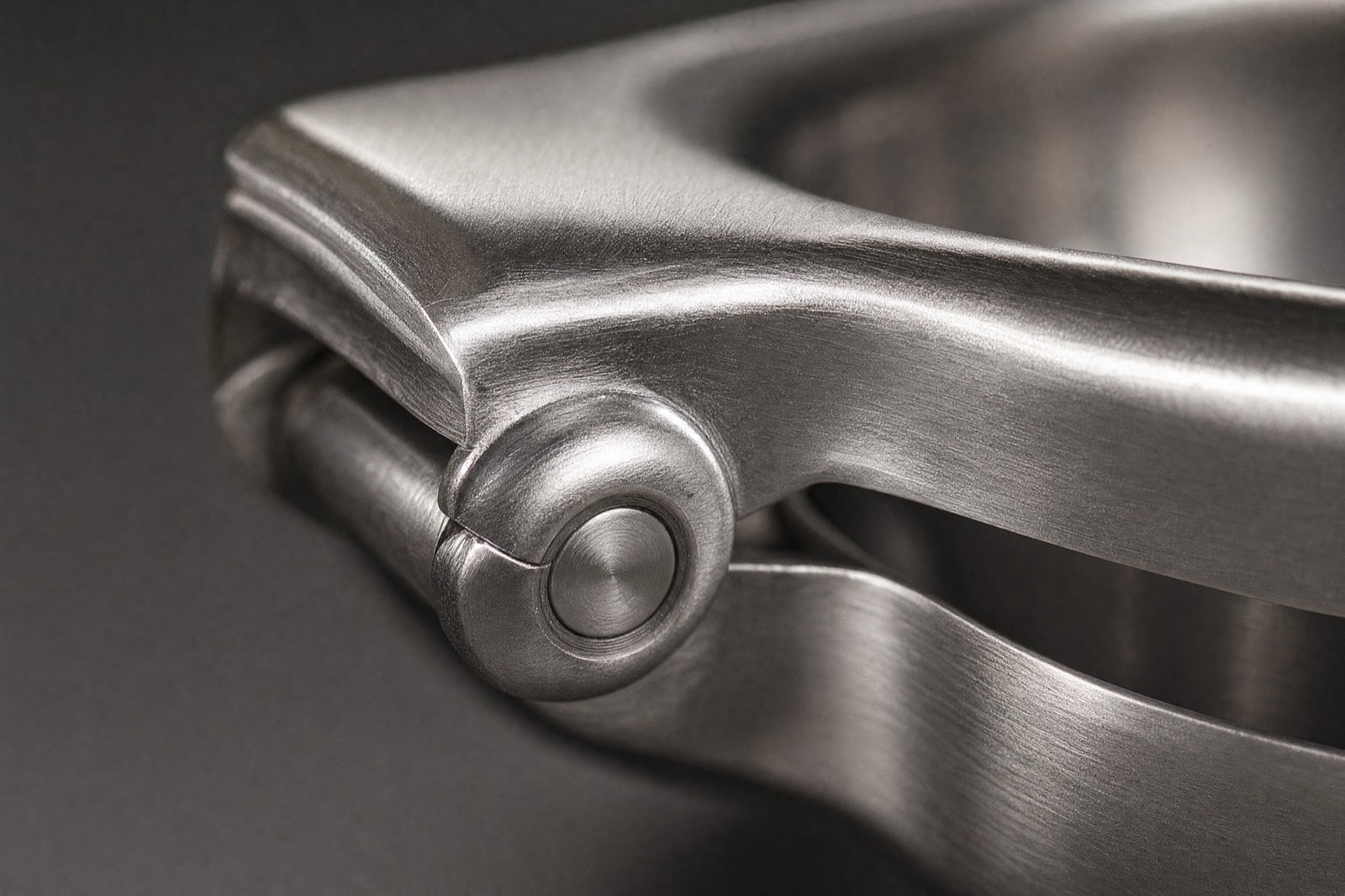 Macro of the reinforced pivot joint of the stainless lemon squeezer, the point where cheaper presses give out
