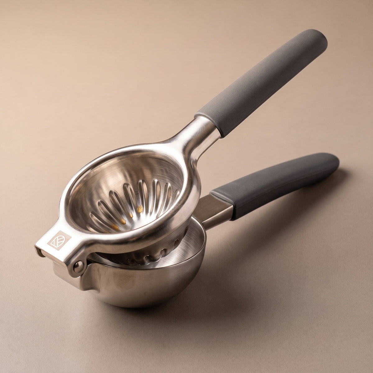 Lemon squeezer closed, three-quarter view
