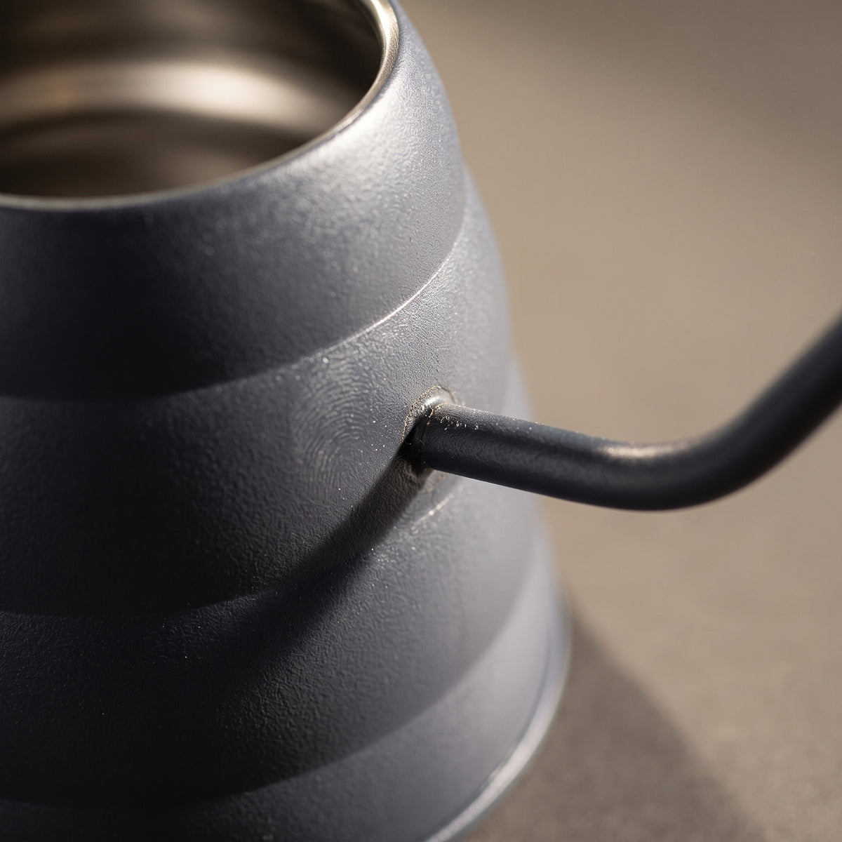 Macro of the spout joint and powder-coated body